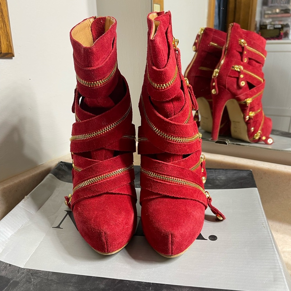 Red zip boots by N.Y.L.A.